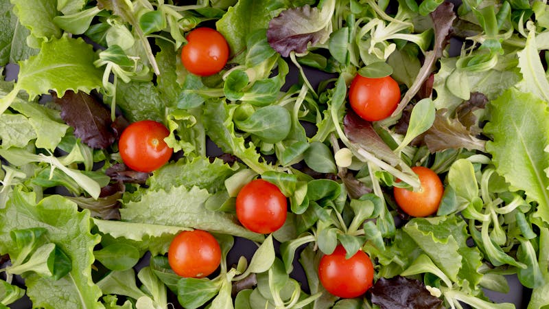 Fresh salad with greens and colorful vegetables